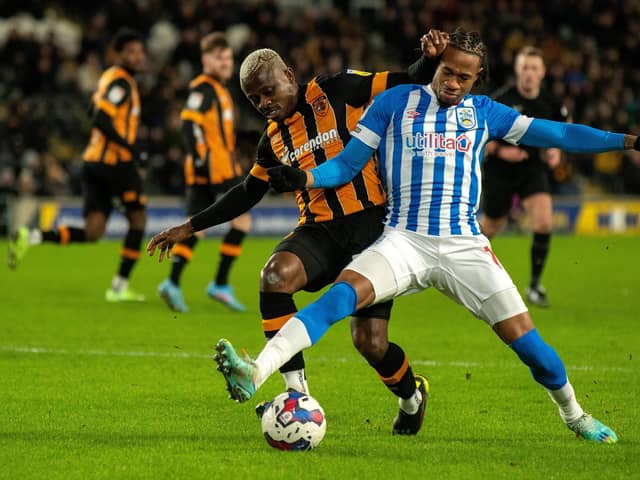 ON A HIGH: Huddersfield Town midfielder David Kasumu