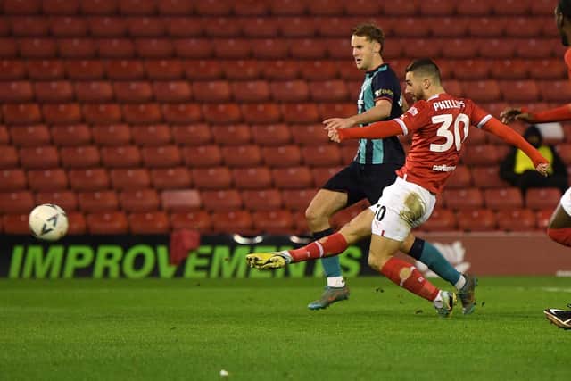 Adam Phillips fires in a splendid second goal for Barnsley against Crewe at Oakwell. Picture: Jonathan Gawthorpe