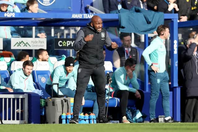 LONDON, ENGLAND - JANUARY 28: Darren Moore, Manager of Huddersfield Town, reacts during the Sky Bet Championship match between Queens Park Rangers and Huddersfield Town at Loftus Road on January 28, 2024 in London, England. (Photo by Richard Pelham/Getty Images)