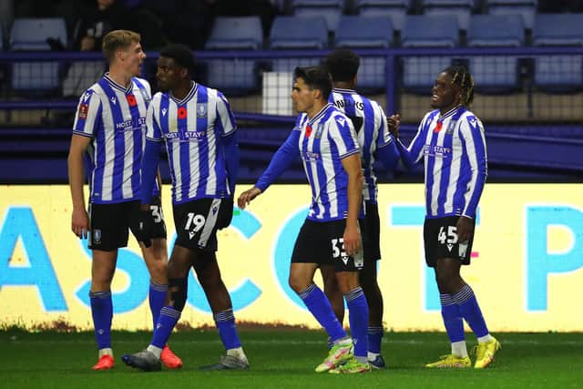 SHEFFIELD, ENGLAND - NOVEMBER 04: Alex Mighten (R) of Sheffield Wednesday celebrates with teammates after scoring the second goal during the Emirates FA Cup First Round match between Sheffield Wednesday and Morecambe at Hillsborough on November 04, 2022 in Sheffield, England. (Photo by Ashley Allen/Getty Images)