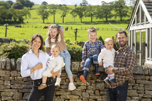 Kelvin Fletcher and his wife Liz Marsland at their farm in Cheshire with their children