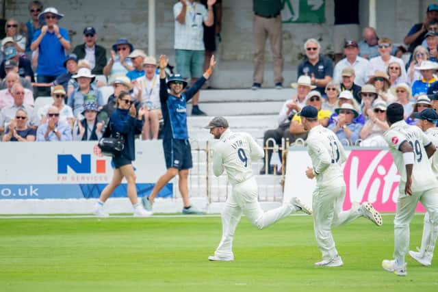 Catch me if you can. Adam Lyth leads the celebrations after taking a brilliant slip catch to remove James Bracey. Picture by Allan McKenzie/SWpix.com