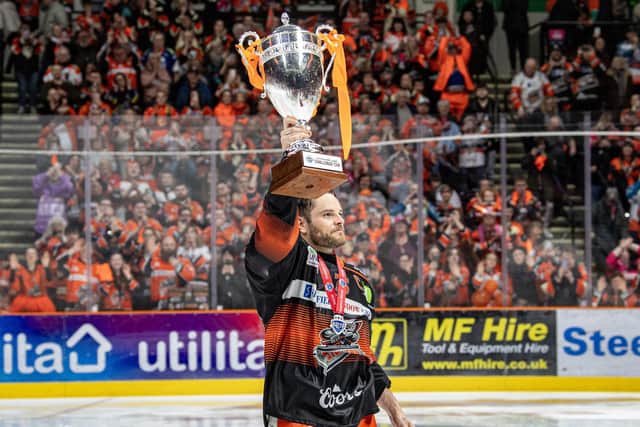 WINNER: Sheffield Steelers' Robert Dowd lifts the trophy after beating the Guildford Flames 3-1 in the 2024 Challenge Cup Final at the Utilita Arena Picture: Tony Johnson.