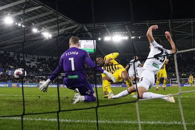 THE GREAT LEVELLER: Rotherham United's Chiedozie Ogbene scores his side's equalising goal to earn a vital point against Swansea City in their Championship clash at the Swansea.com Stadium  Picture: Nick Potts/PA