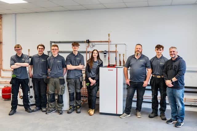 Calderdale College students and staff with new ground and air source heat pumps. Picture by Chris Hellawell