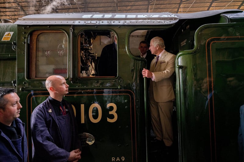 King Charles inspects the locomotive's cab