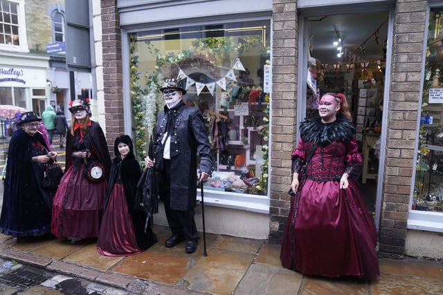 Hundreds of goths descend on the seaside town for the third day of the event despite the rainy weather.