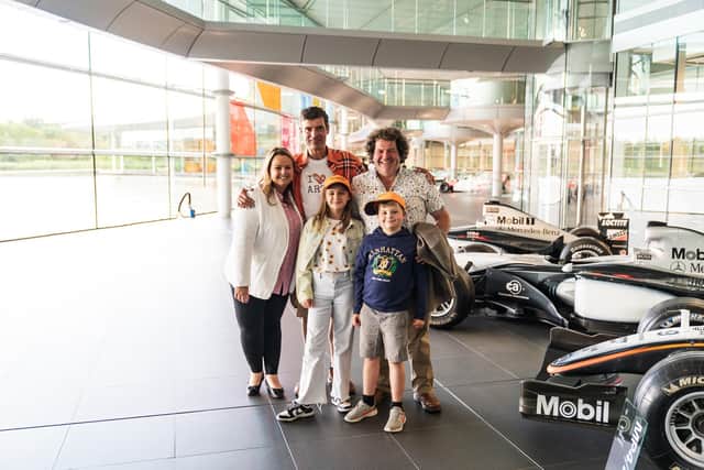 Claire and daughter Ava Young and Richard and son Charlie Hampshire at the McLaren Technical Centre with Nick Corston of STEAM Co