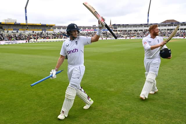 Joe Root, left, and Jonny Bairstow salute the crowd after guiding England to victory in last year's Edgbaston Test against India. Photo by Gareth Copley/Getty Images.