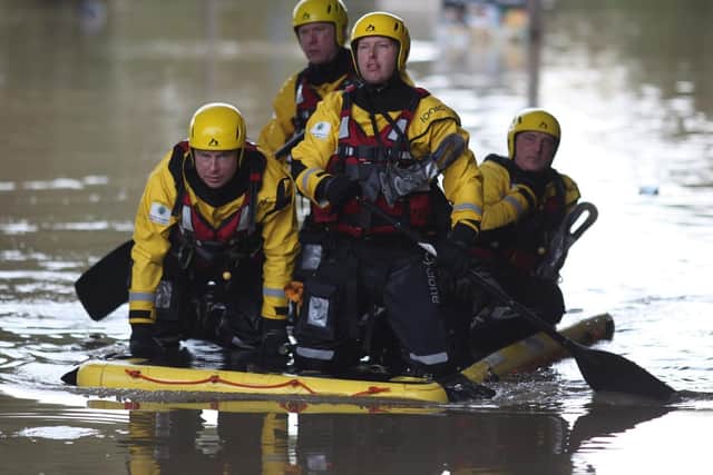 Firefighters responding to the floods in Catcliffe
