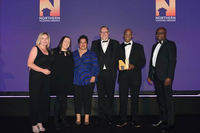 Receiving the Northern Housing Team of the Year Award 2024 from Steve Gayter (centre), Executive Dir