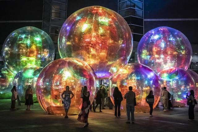 People view light installation Evanescent by artist Atelier Sisu, part of Light Night Leeds, the UK's largest annual arts and light festival. Photo credit: Danny Lawson/PA Wire