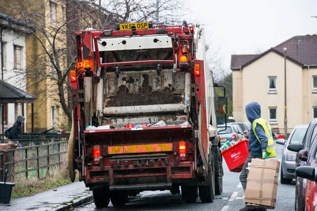 A bin man was left with serious injuries after being hit by a car while collecting bins