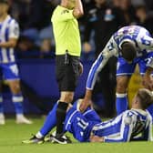 INJURY: Josh WIndass feels the effect of a dead leg against Middlesbrough