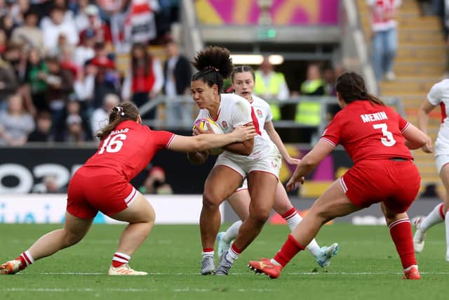 Top of the world: Tatyana Heard, right, playing for England against Canada in last September's World Cup final. The comedown from that moment took a lot more out of her than she expected. (Picture: David Rogers/Getty Images)