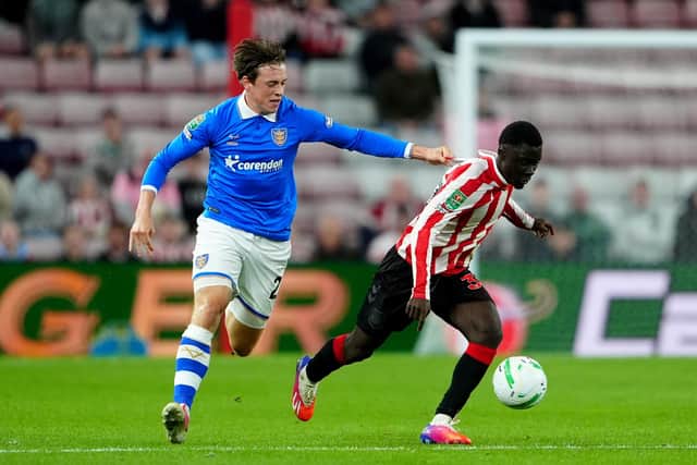 Hull City's Elliot Stroud (left) and Sunderland's Jocelin Ta Bi battle for the ball during the Carabao Cup third round match at the Stadium of Light, Sunderland. Picture date: Tuesday September 8, 2026.