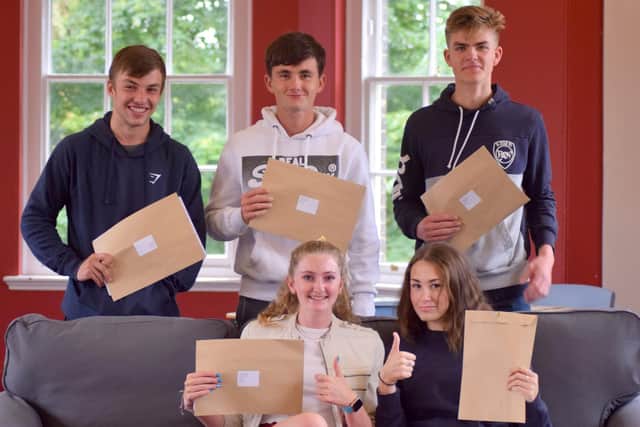 It's a thumbs up for these Pocklington School students on GCSE results day.