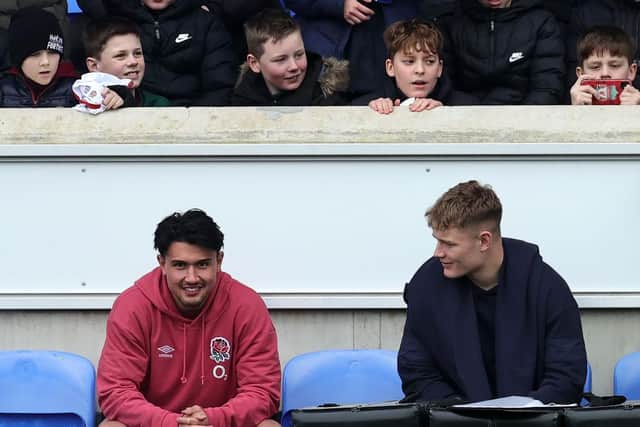 We're watching you: Marcus Smith (L) and Fin Smith sit out training on the bench as young fans watch on during the England training session held at the LNER Community Stadium on March 01, 2024 in York, England. (Picture:  David Rogers/Getty Images)