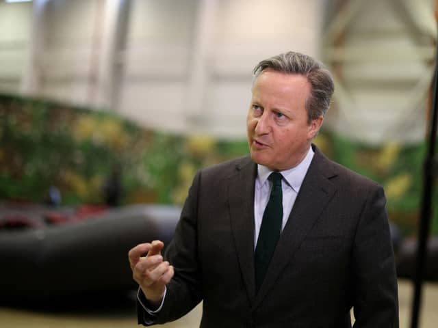 Foreign secretary Lord David Cameron speaks to the media.