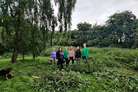 Volunteers from Aviva, Benenden Health, Joseph Rowntree Foundation and Housing Trust, boxxe and Portakabin taking part in the York Cares Big Community Challenge 2022 at Westfield Marsh. Photo: York Cares