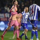 NO LETTING UP: Sheffield Wednesday captain Barry Bannan demands more of Bambo Diaby in the 2-0 defeat at home to Leeds United