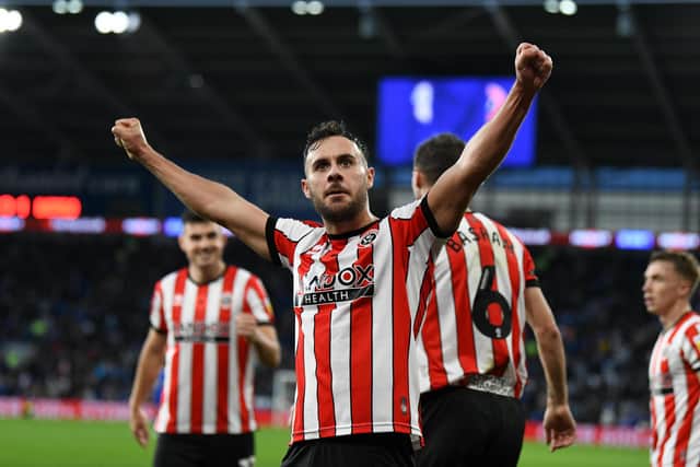 Sheffield United's George Baldock celebrates scoring the opening goal during the Sky Bet Championship match at Cardiff City Stadium, Cardiff. Picture: Simon Galloway/PA Wire.