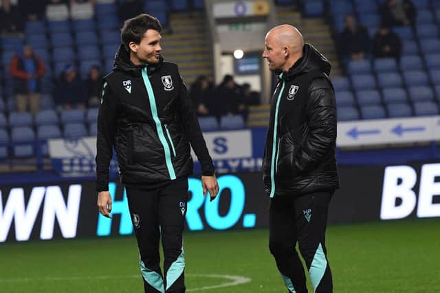 IN THE BACKGROUND: Henrik Pedersen (right) fell in love with Sheffield Wednesday as Danny Rohl's assistant (Image: Steve Ellis)