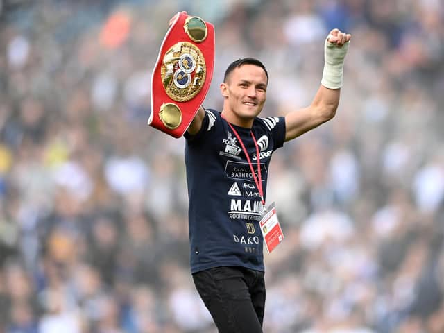 LEEDS, ENGLAND - APRIL 02: IBF world featherweight champion, Josh Warrington shows off their belt to the fans prior to the Premier League match between Leeds United and Southampton at Elland Road on April 02, 2022 in Leeds, England. (Photo by Stu Forster/Getty Images)