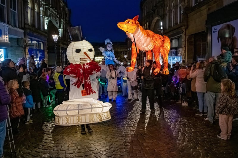 Thousands of visitors flock to see the Illuminated puppets in the Halifax Christmas Parade brought to life by Handmade Productions based in Hebden Bridge photographed for The Yorkshire Post by Tony Johnson.
