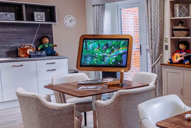 Zomu Table Care home delights residents with new interactive rainbow table
