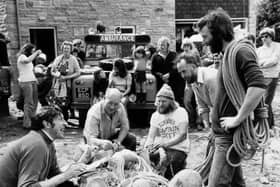 Members of the Upper Wharfedale Fell Rescue Association check equipment in 1976. (left to right) Chris Baker, Fred Clayton, president; Alan Stockdale, Harry Long, underground leader, and Phil Haigh.