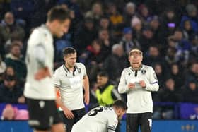 Sheffield Wednesday players pick up and read a note passed to Leicester City's Harry Winks (not pictured) during the Sky Bet Championship match. Picture: Mike Egerton/PA Wire.