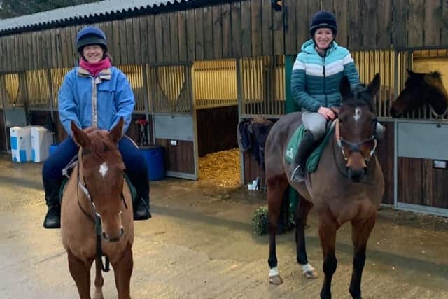 Early starts: Charlotte Russell has been riding out at the stables of Mark Walford, Paul Midgley and Tony Coyle as she prepares for her racecourse debut.