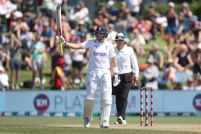 England's Joe Root celebrates his half-century in the first Test against New Zealand (Picture: MARTY MELVILLE/AFP via Getty Images)