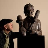From Coal Queens to Comedy Kings: The Sculptures of Graham Ibbeson, is a unique trail that spans the museums indoor and outdoor spaces. It offers a fascinating journey through important moments in mining history while celebrating beloved performers all through the work of world-renowned sculptor Graham Ibbeson.. Graham is pictured with the sculpture of Ken Dodd. Picture taken by Yorkshire Post Photographer Simon Hulme