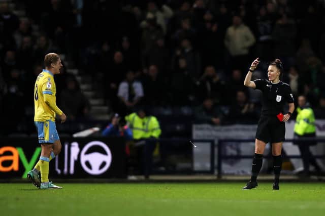 Referee Rebecca Welch shows a red card to George Byers of Sheffield Wednesday after clashing off the ball with Mads Froekjaer of Preston North End (Picture: Jess Hornby/Getty Images)