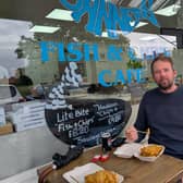 Coun Andrew Hollyer, York Council Liberal Democrat opposition planning spokesperson, eating fish and chips.
