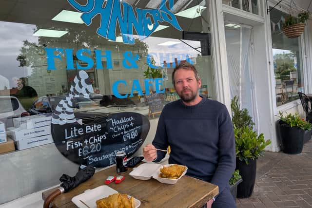 Coun Andrew Hollyer, York Council Liberal Democrat opposition planning spokesperson, eating fish and chips.