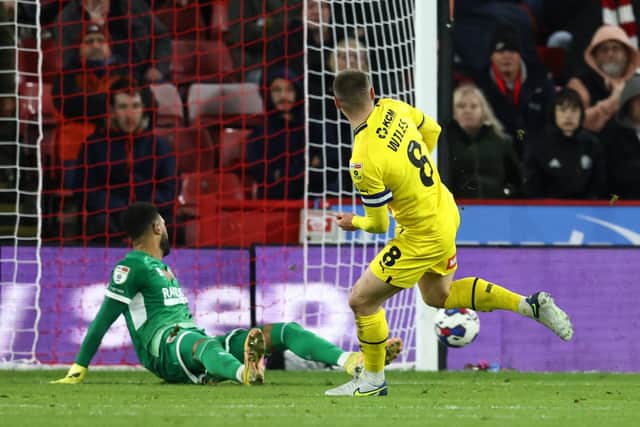 KILLER BLOW. Ben Wiles of Rotherham United scores the game's only goal past Wes Foderingham