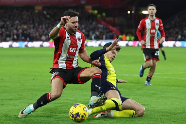 CALF COMPLAINTS: George Baldock's ongoing muscle problems have hampered Sheffield United this season