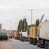 Lorries queue to enter the Port of Felixstowe in Suffolk in October, as workers returned to work at the UK's busiest container port following an eight day strike in a long-running dispute over pay.