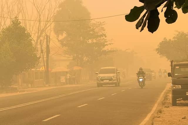 A thick cloud of smoke currently hangs over the region as the peat fires continue.