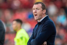 MISREADING: But Barnsley manager Neill Collins addressed things at half-time
