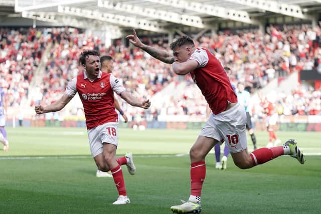 Matchwinner: Rotherham United's Jordan Hugill celebrates scoring what would prove to be the winning goal against his former club Norwich City as Ollie Rathbone, left, joins the celebrations. (Picture: PA)