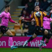 Bradford top-scorer Andy Cook holds the ball in front of a Northampton defender. Picture: Bruce Rollinson