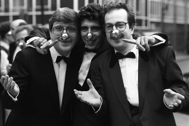 BBC radio DJ's Simon Bates, Gary Davies and Steve Wright promote Comic Relief's Red Nose Day on March 10, 1989. (Photo by Douglas Doig/Express/Getty Images)