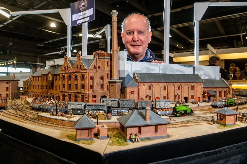 Colin Linley, of York, with his 00 Gauge layout of Copper Wort - Burton on Trent - 1900 - 1935 Brewery and High Street. Based on the Bass, Worthington and Ind Coope brewery buildings and track layouts of Burton on Trent. The display has small locos with Midland Railway wagons carrying full and empty beer casks to and from the main line. The layout took around 5-6 years to build at around 1,000 hours per year