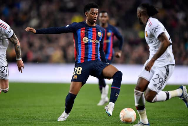 Barcelona's Spanish defender Alejandro Balde controls the ball during the UEFA Europa League round of 32 first-leg football match between FC Barcelona and Manchester United (Picture: PAU BARRENA/AFP via Getty Images)