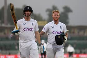 Well played, that man. Harry Brook and a beaming Ben Stokes leave the field after the Yorkshireman's maiden Test hundred on a record-breaking day in Rawalpindi. Photo by Matthew Lewis/Getty Images.