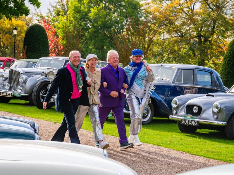 Pictured Christopher and Belinda Fordy with Michael and Liz Bell dressed as ABBA band members walk through the line up of classic cars whist at Bowcliffe Hall near Bramham.